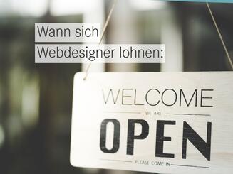 Schaufenster mit Welcome-Schild – wann sich ein Webdesigner für kleine Unternehmen lohnt.